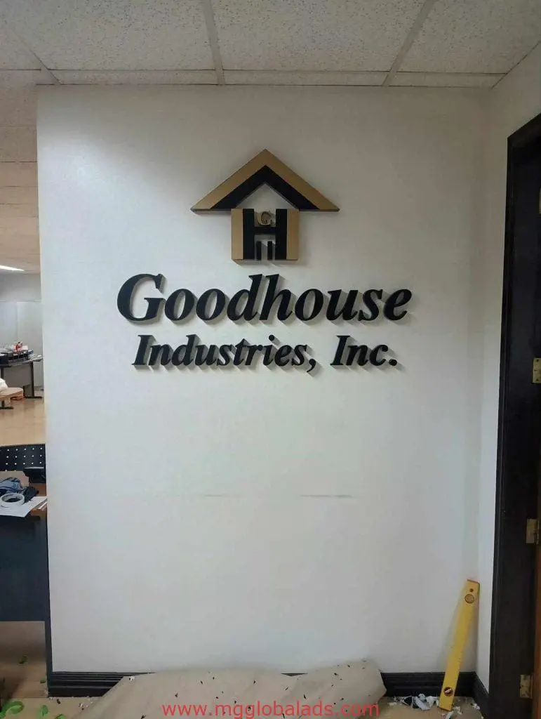 Acrylic indoor office signage for Goodhouse Industries, Inc. in Makati featuring logo on white wall by M&G Global Ads.