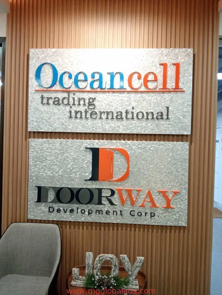 Indoor wall signage for Oceancell Trading International and Doorway Development Corp in Mandaluyong by M&G Global Ads.