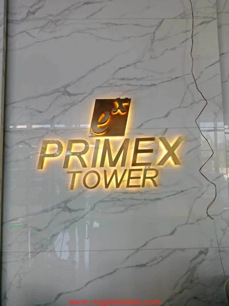 Illuminated indoor building signage for Primex Tower with Arabic script, Makati location, on marble wall by M&G Global Ads.