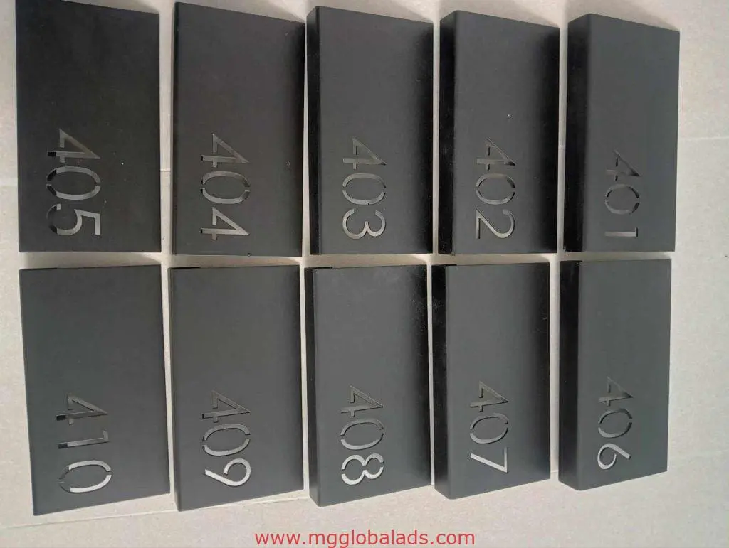 Acrylic room number signage plaques, numbers 401-410 in silver, displayed in Makati by M&G Global Ads.