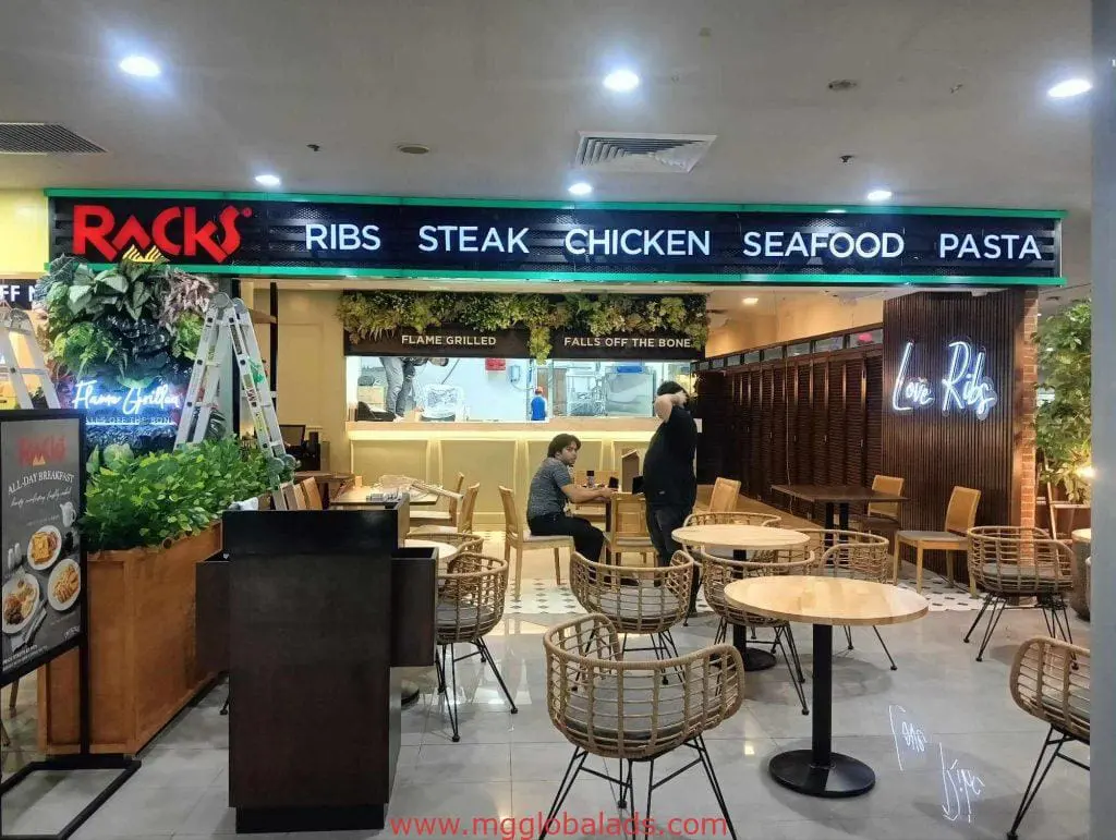 LED signage for Racks restaurant in Makati displays ribs, steak, chicken, seafood, and pasta. by M&G Global Ads.