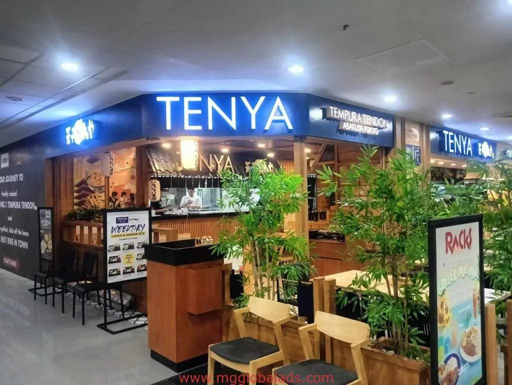 TENYA LED signage at restaurant in BGC with wood chairs, plants, Japanese decor, menu boards. By M&G Global Ads.