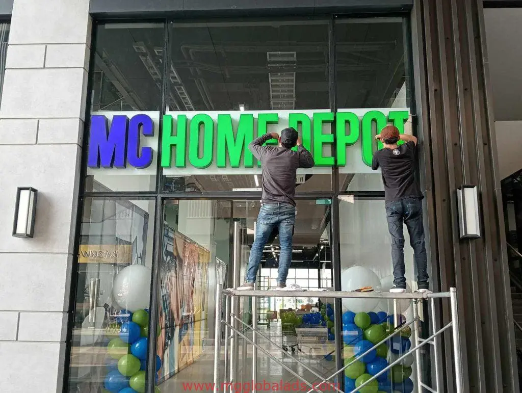 MC HOME DEPOT channel letters signage installation in Quezon City store entrance with balloons, by M&G Global Ads.