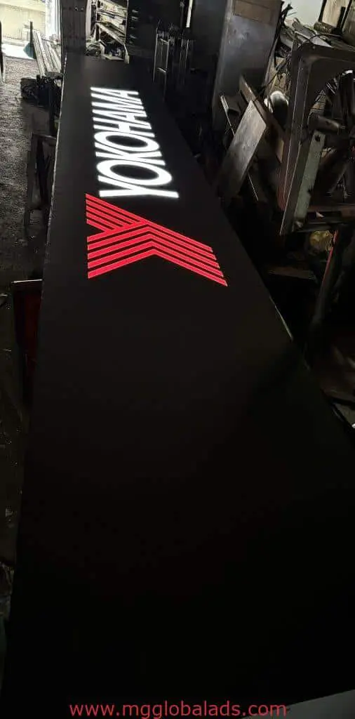 Shopfront metal signage for KROCOS with red K and glowing letters in workshop, Makati location, by M&G Global Ads.