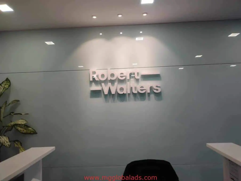 Robert Walters raised white acrylic signage in a modern office, Makati reception desk by M&G Global Ads.