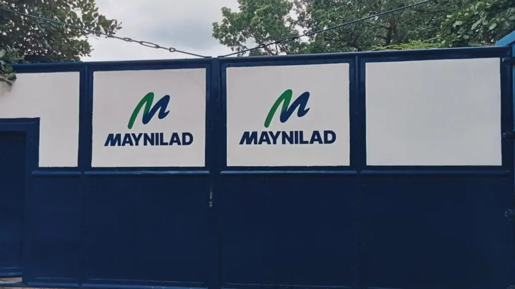 Acrylic signage for Maynilad on a blue gate with logo panels in Mandaluyong, M&G Global Ads.