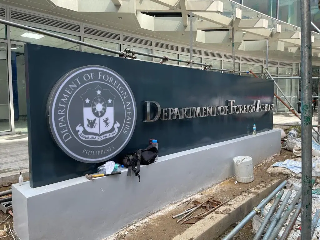 Outdoor pylon signage for Department of Foreign Affairs Philippines in Ortigas with construction tools, by M&G Global Ads.