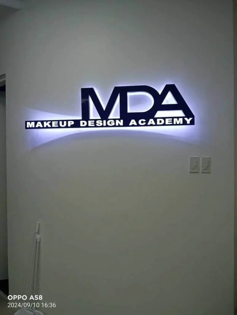 LED signage for MDA MAKEUP DESIGN ACADEMY with black and white text, wall-mounted in Makati by M&G Global Ads.