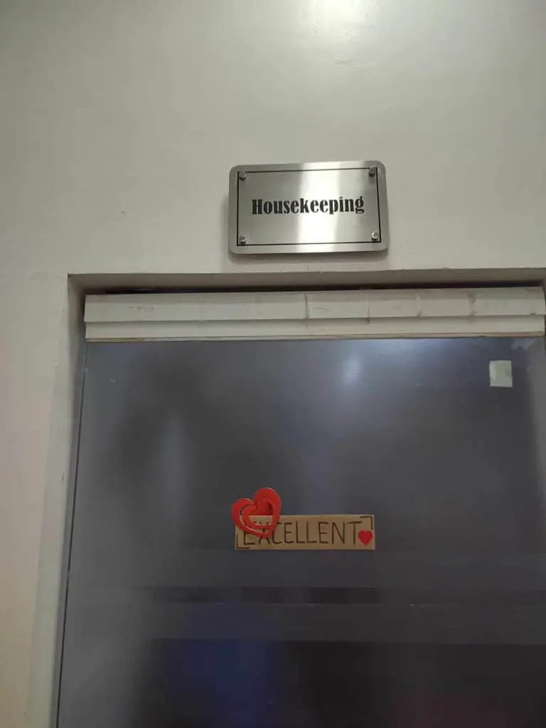 Housekeeping stainless engrave signage on a frosted glass door, with stickers, in Makati by M&G Global Ads.