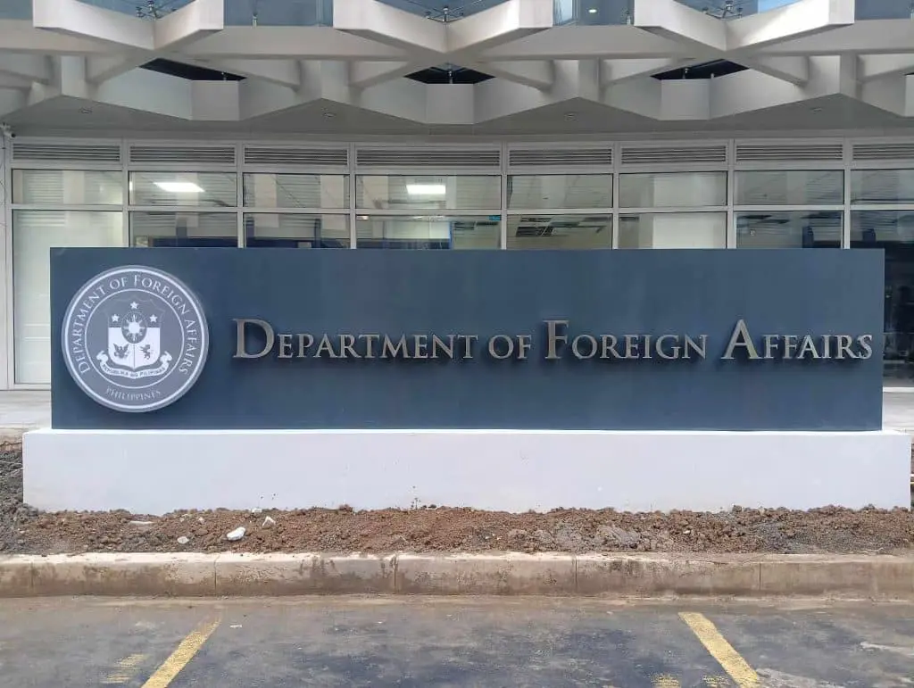 Department of Foreign Affairs outdoor building signage with official seal in Ortigas, unfinished frontage. By M&G Global Ads.