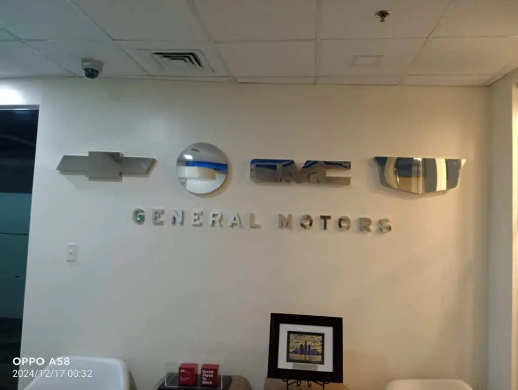 Metallic Chevrolet, Buick, GMC, Cadillac indoor signage for General Motors in Makati. By M&G Global Ads.