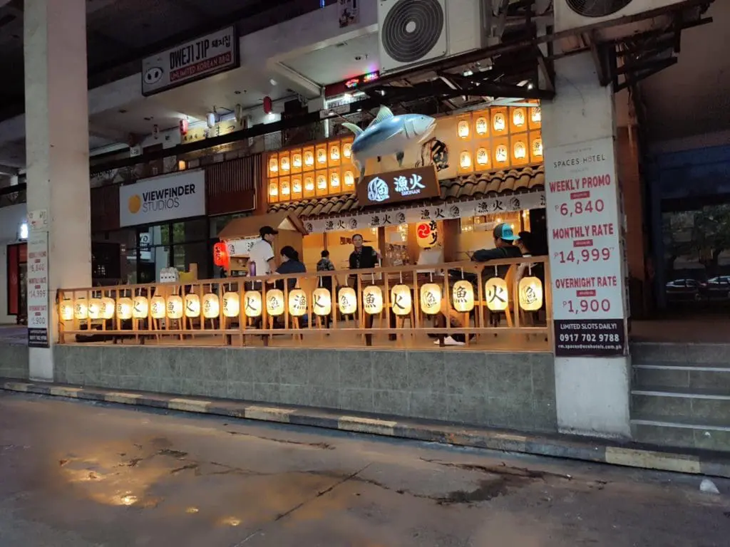 Outdoor restaurant signage and metallic hotel promo signs for Viewfinder Studios in Makati by M&G Global Ads.