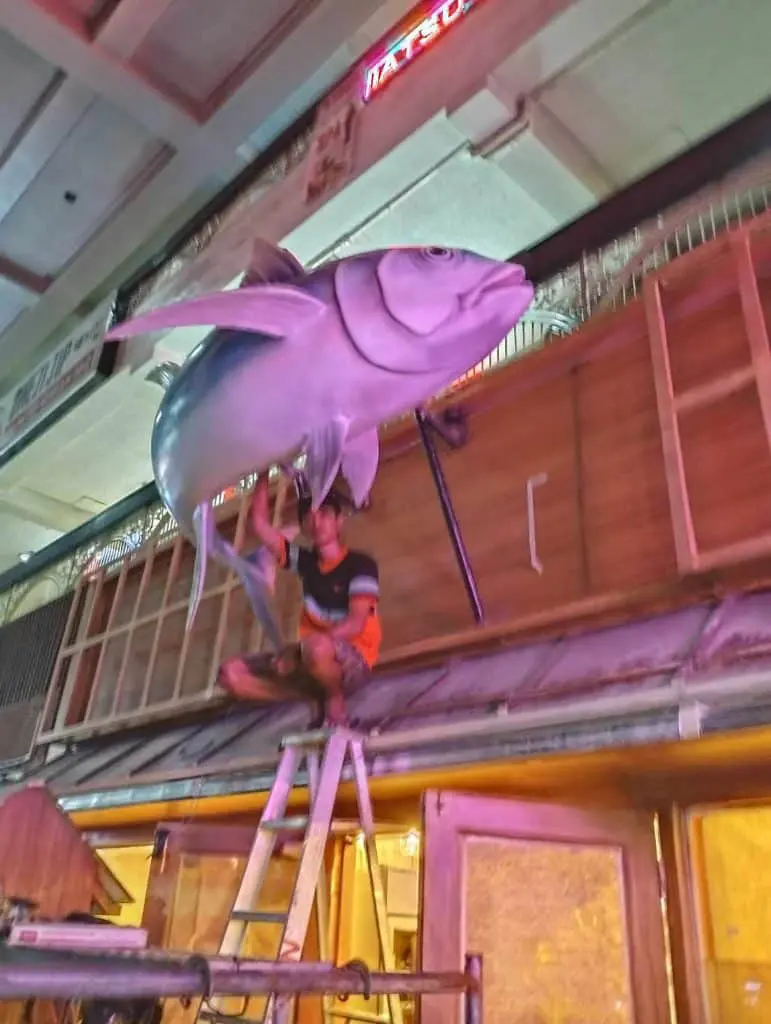 Creative 3D signage installation for restaurant in BGC, featuring a realistic fish sculpture above the entrance by M&G Global Ads.