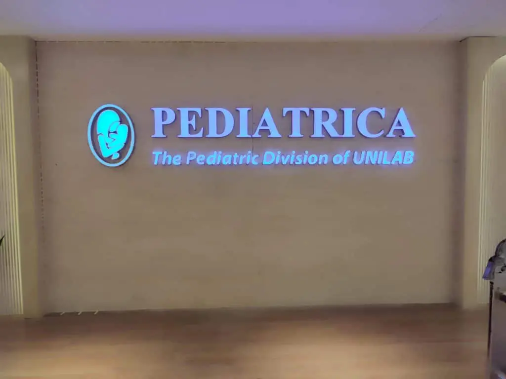 LED indoor wall signage for PEDIATRICA UNILAB in Ortigas, glowing blue and white by M&G Global Ads.