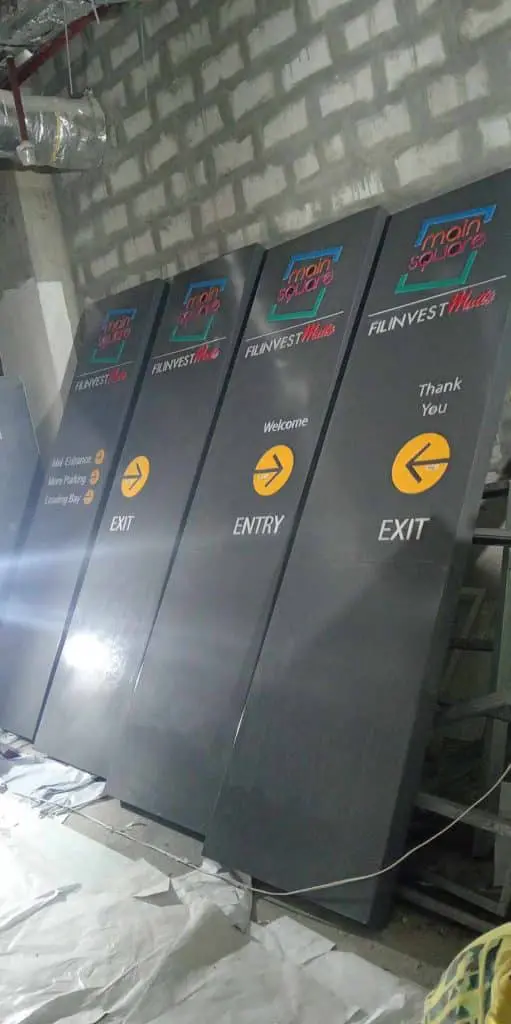 Acrylic wayfinding signage for Filinvest Malls in Ortigas showing Main Square logos and directions by M&G Global Ads.