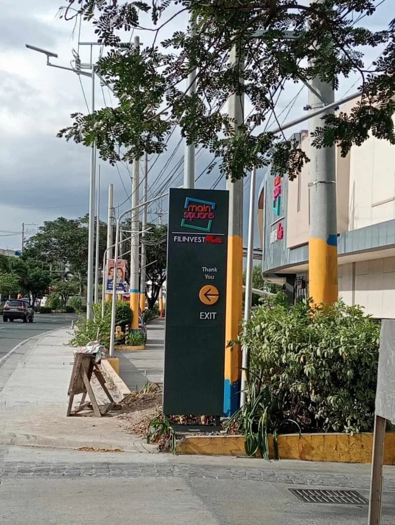 Outdoor directional building signage for Main Square Filinvest in Makati, green sign with exit arrow by M&G Global Ads.