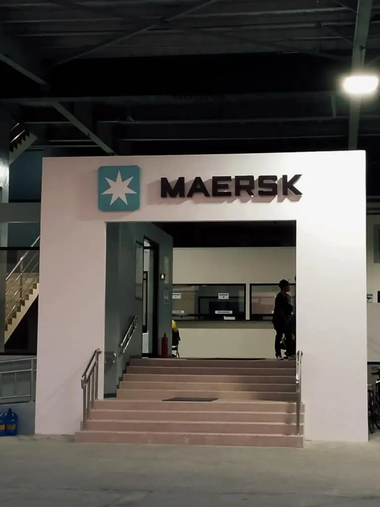 Maersk metallic signage with logo on white wall at office entrance, Makati location, by M&G Global Ads.