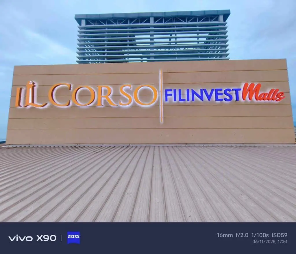 Acrylic mall signage for IL CORSO FILINVEST in Mandaluyong, modern structure above. By M&G Global Ads.