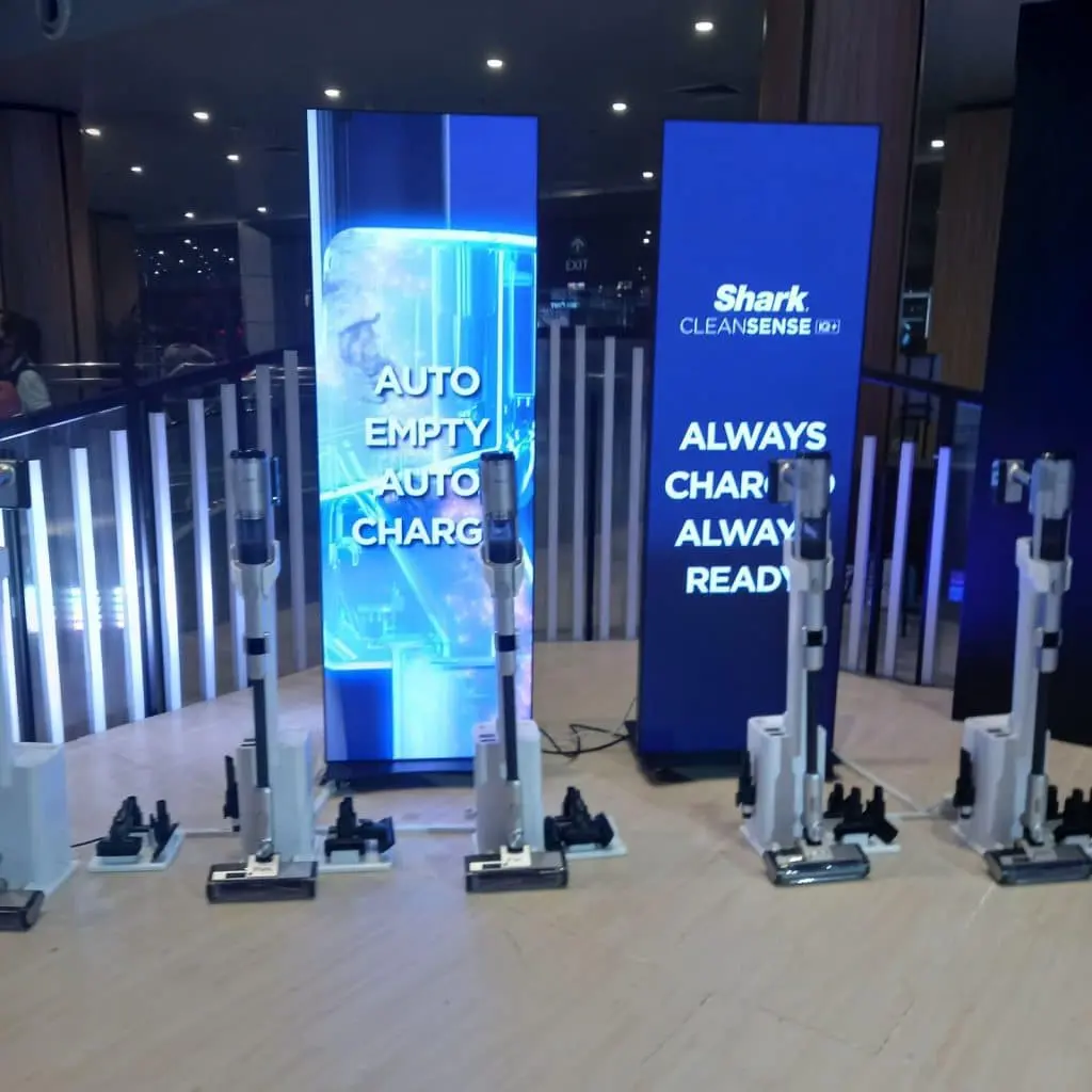 Shark CleanSense vacuum display with indoor digital signage in Metro Manila, featuring product messages by M&G Global Ads.