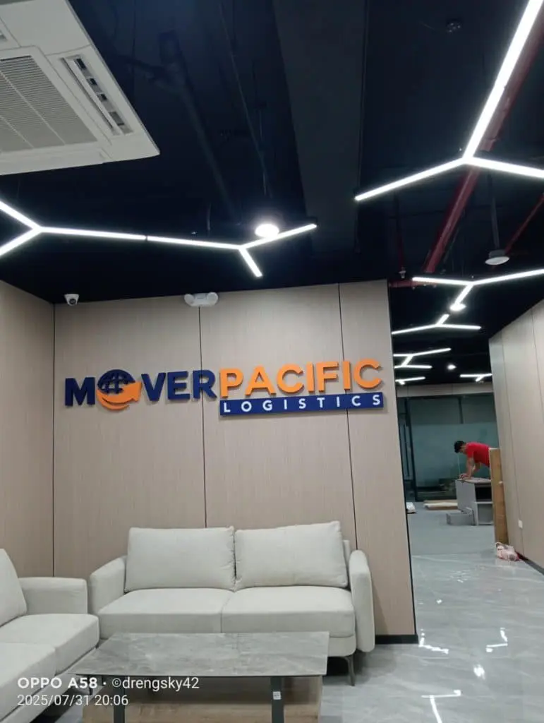 Indoor signage for MOVER PACIFIC LOGISTICS in a modern Metro Manila office by M&G Global Ads.