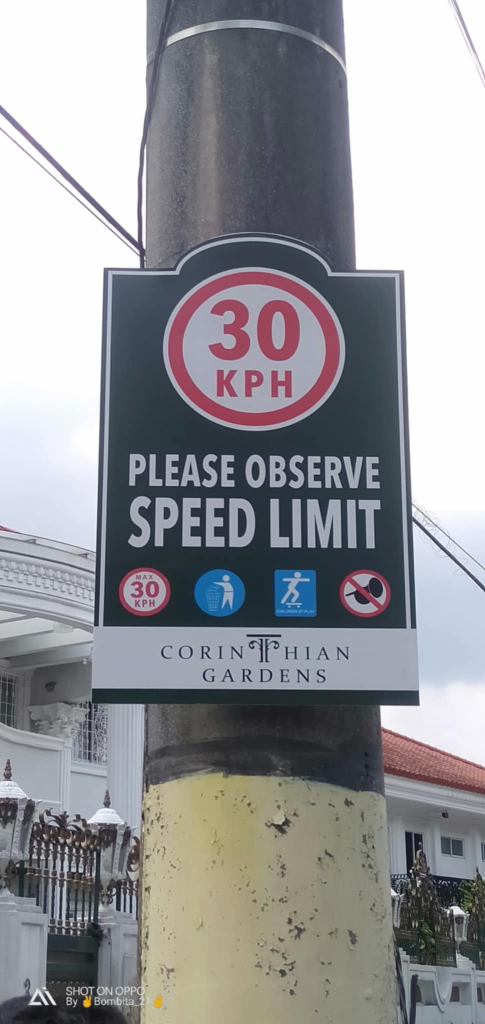 Speed limit street signage for Corinthian Gardens, Quezon City with icons, 30 KPH, CCTV by M&G Global Ads.