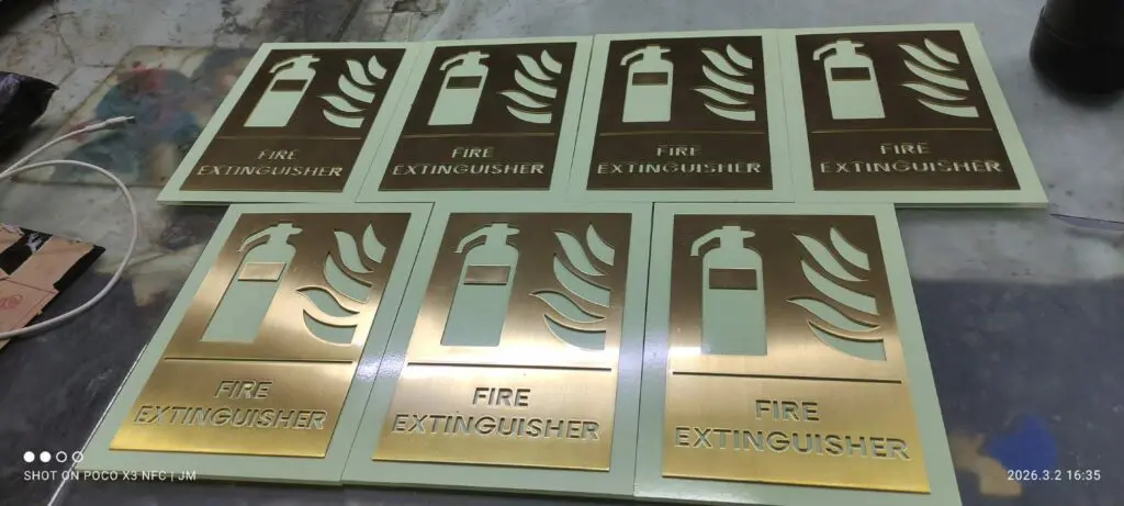 Gold and green acrylic fire extinguisher safety signs, labeled FIRE EXTINGUISHER. Sign maker Philippines by M&G Global Ads.