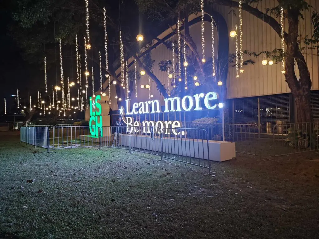 Outdoor acrylic and LED signage "Learn more. Be more." and green SIS GHL letters, Metro Manila, sign maker Philippines by M&G Global Ads.