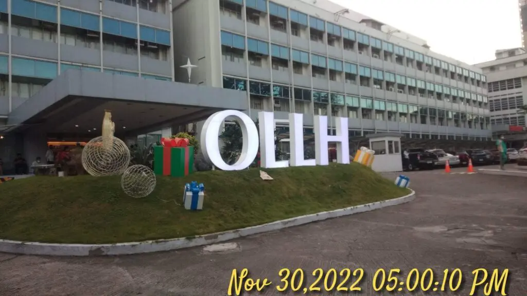 Outdoor acrylic signage OLLH with Christmas decor, multi-story building, Metro Manila, sign maker Philippines by M&G Global Ads.