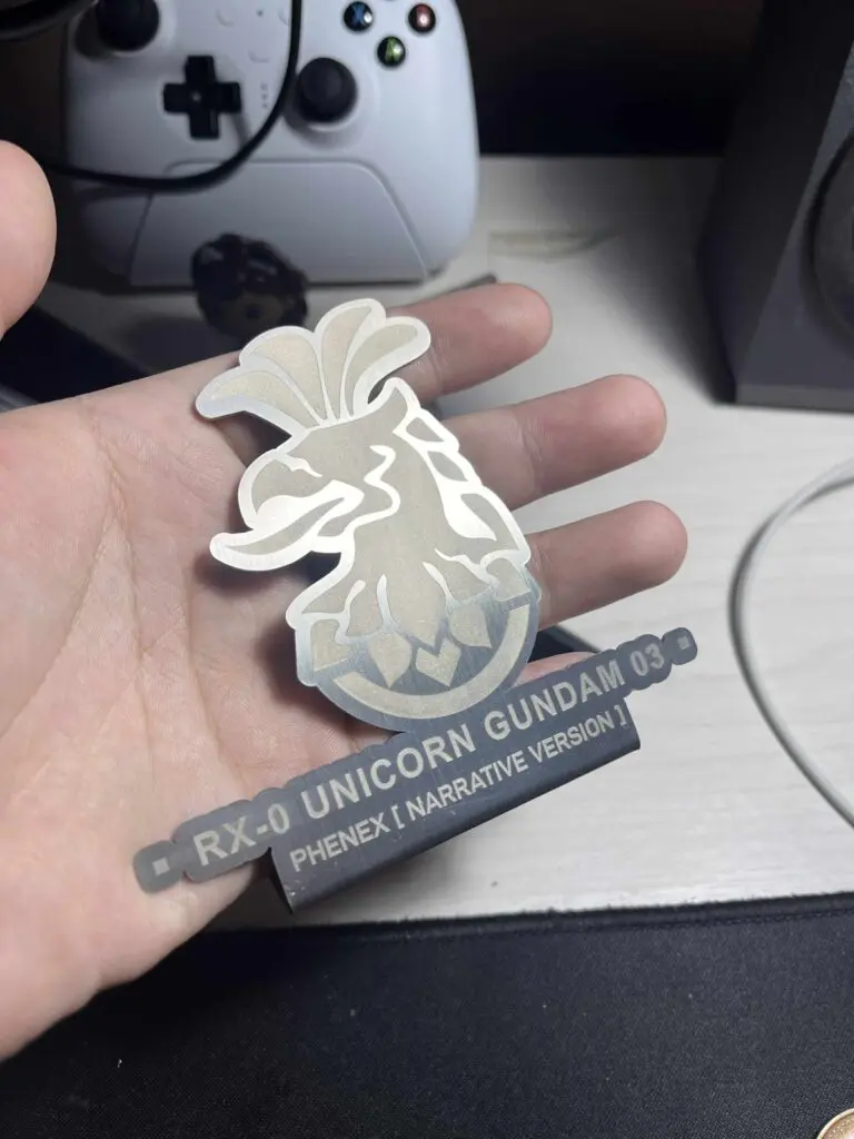 Stainless steel engraving signage of RX-0 Unicorn Gundam 03 by sign maker Philippines, gaming setup. By M&G Global Ads.