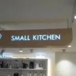 Metallic hanging sign with blender icon and SMALL KITCHEN text in a Makati appliance store by M&G Global Ads.