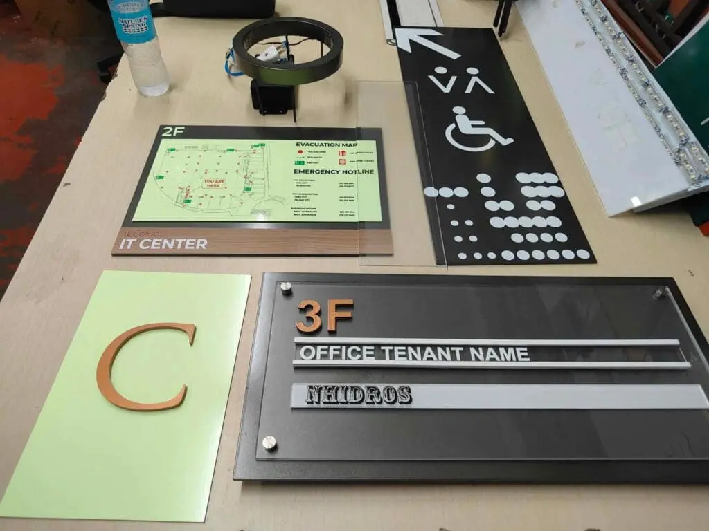 Acrylic office signs, braille accessibility sign, floor directory signage for NHIDOS, Metro Manila by sign maker Philippines M&G Global Ads.