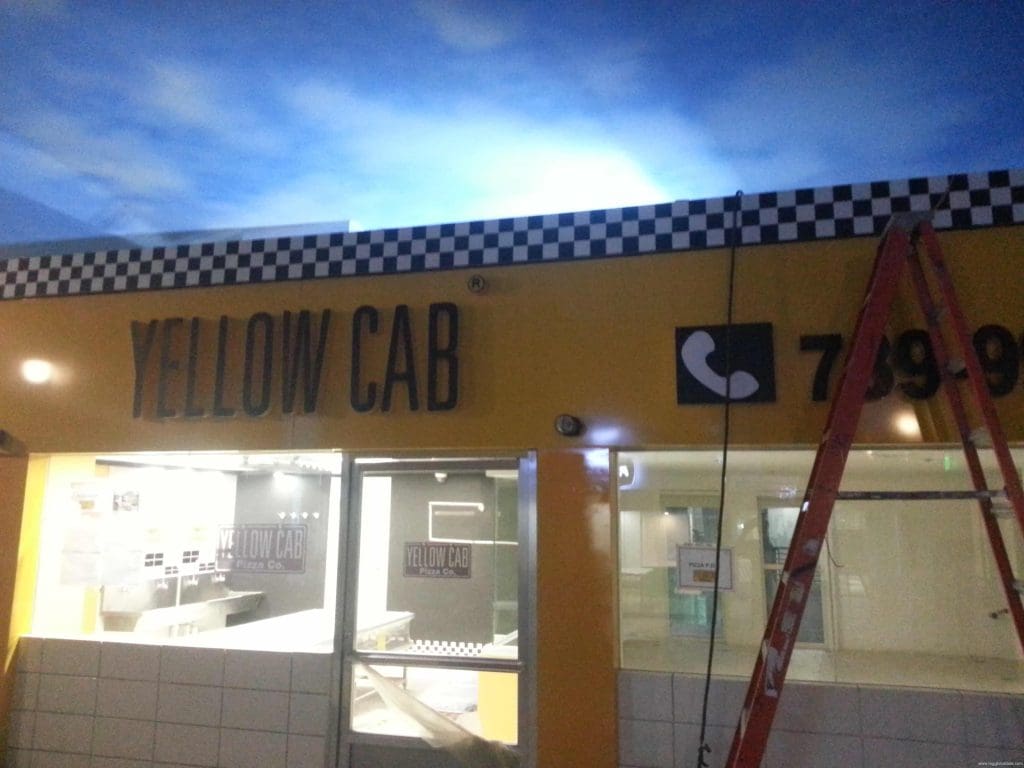 YELLOW CAB lighted signage for taxi service storefront in Makati, with checkered border and phone sign by M&G Global Ads.