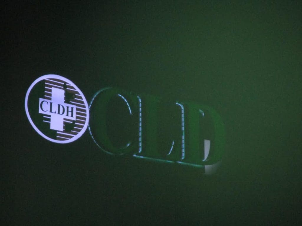 Indoor illuminated signage for CLDH with circular logo, greenish-lit in Makati at night, by M&G Global Ads.