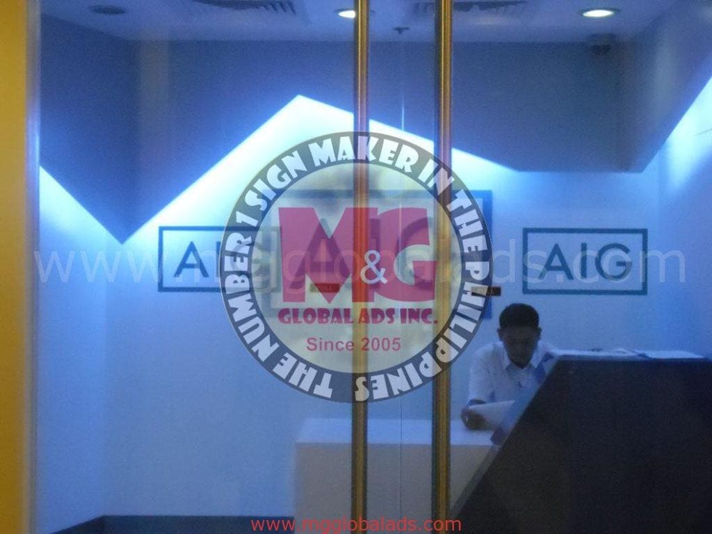 Acrylic signage and AIG signs for reception area, Quezon City office lobby, by M&G Global Ads.