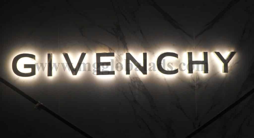 GIVENCHY illuminated acrylic signage with bold white letters on a marble-patterned background in Makati by M&G Global Ads.