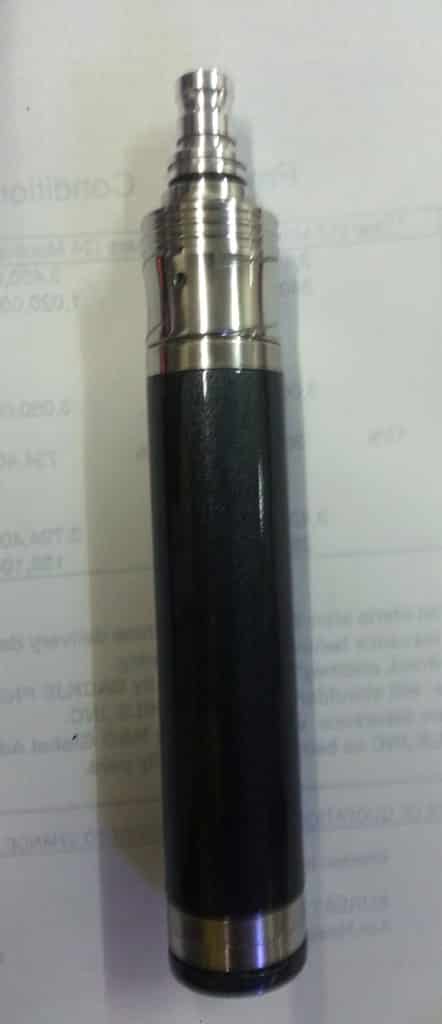 Indoor signage for vape store, black and silver device on printed paper, Makati location by M&G Global Ads.