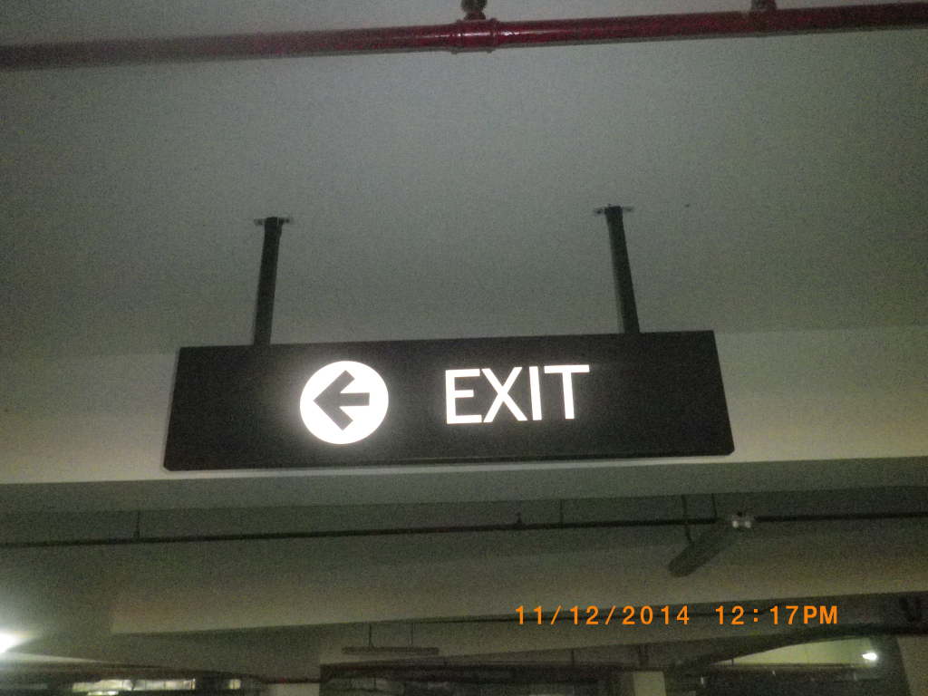 Outdoor directional signage in Makati reads KEEP RIGHT with right arrow, timestamped 11/12/2014 12:23PM by M&G Global Ads.