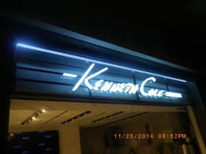 store signs Kenneth Cole 