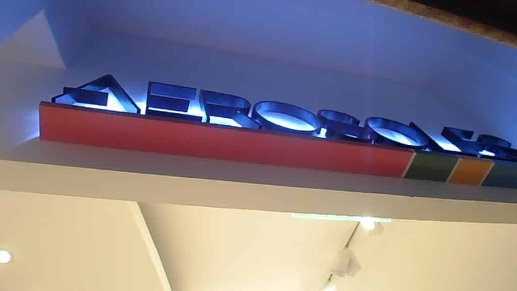 AEROSOLES storefront signage, bold blue LED channel letters with red stripe in Makati, by M&G Global Ads.