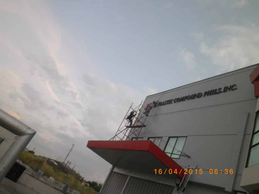 Outdoor building signage installation for PLASTIC COMPOUND PHILS. INC. in Pasig by M&G Global Ads.