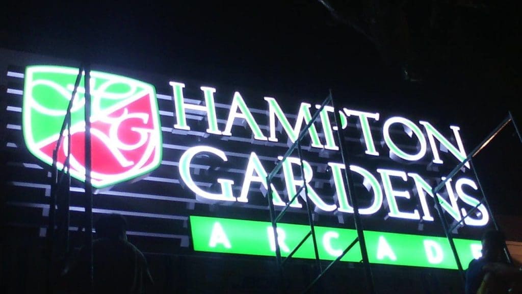 Isometric LED building signage for Hampton Gardens Arcade in Quezon City, construction details and H logo by M&G Global Ads.