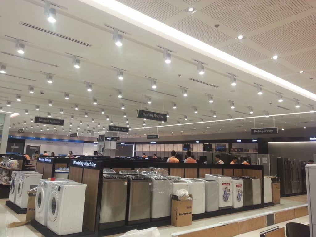 Skyworth LED signage on empty display shelves in a bright electronics store in Quezon City by M&G Global Ads.