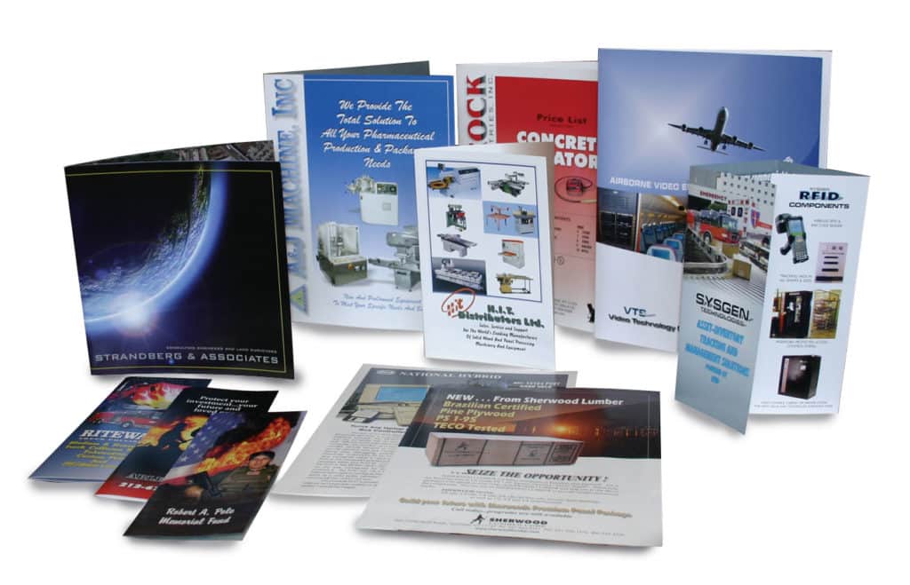 Acrylic signage brochures and pamphlets with various designs and logos, displayed in Mandaluyong, by M&G Global Ads.