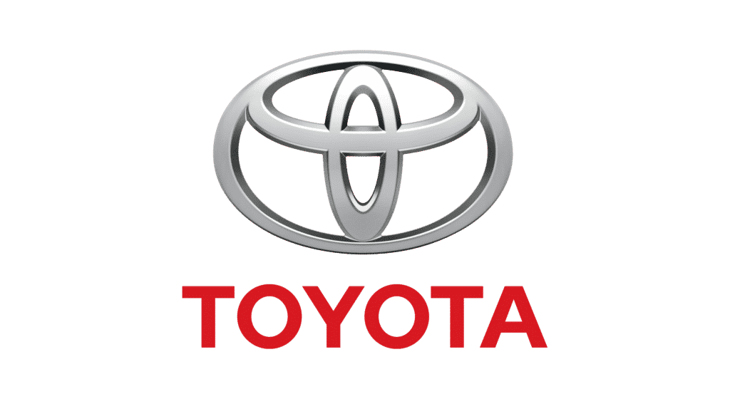 Acrylic indoor signage for Toyota with silver oval logo and red TOYOTA text, white background, Makati location by M&G Global Ads.