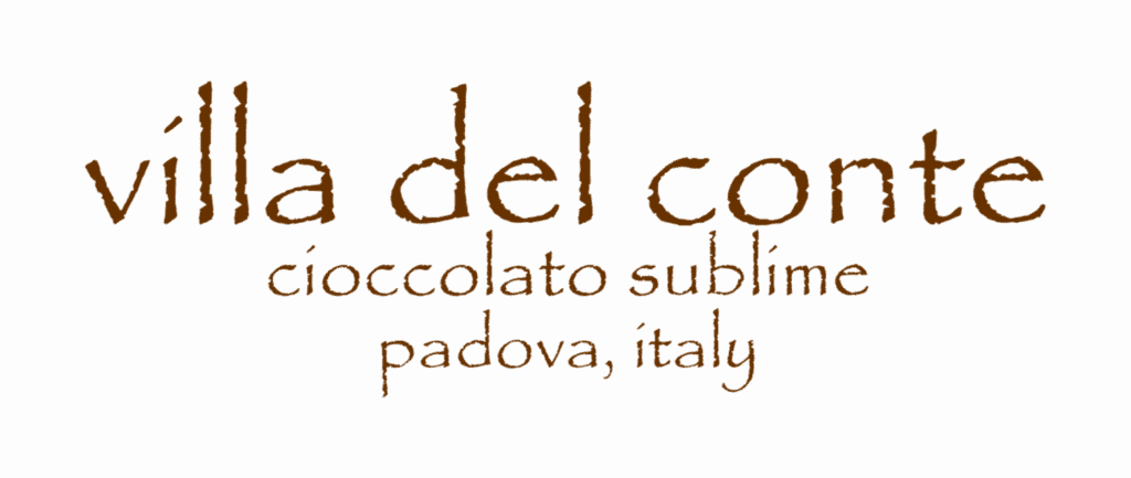 Indoor signage for Villa Del Conte in brown handwritten-style font on a light background at BGC by M&G Global Ads.