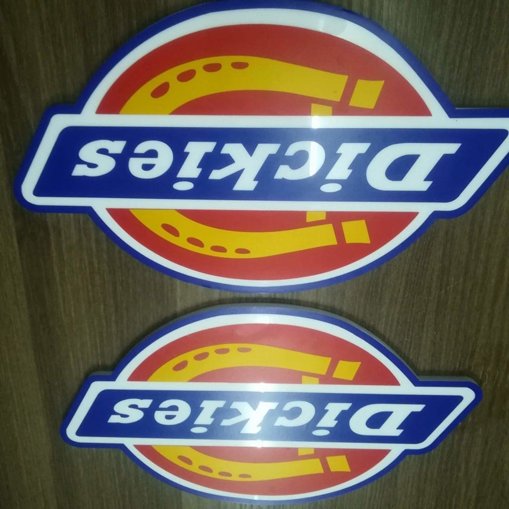 Metallic Dickies building signage in red, yellow, blue, and white on wood, displayed in Makati by M&G Global Ads.