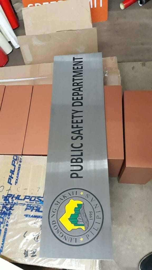 Metal PUBLIC SAFETY DEPARTMENT building signage for Makati City client, outdoor installation in BGC by M&G Global Ads.
