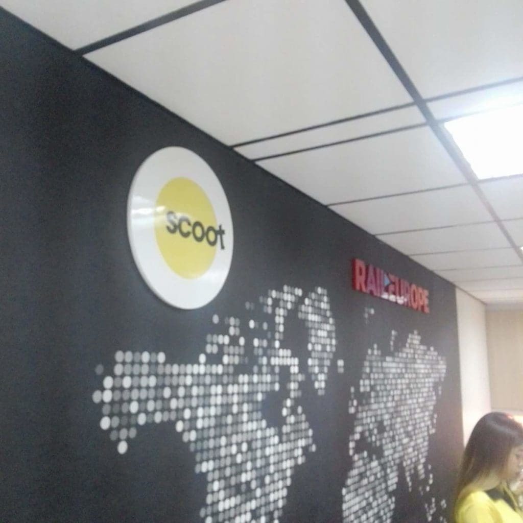 Indoor office signage for Scoot and Rail Europe with world map design in Makati by M&G Global Ads.