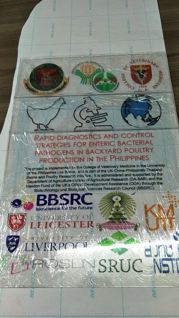 Laminated poster signage for university clients in Makati with logos and research title, by M&G Global Ads.