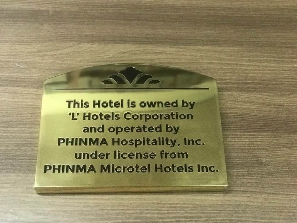 Gold hotel lobby signage plaque for L Hotels Corporation, PHINMA Hospitality in Makati by M&G Global Ads.